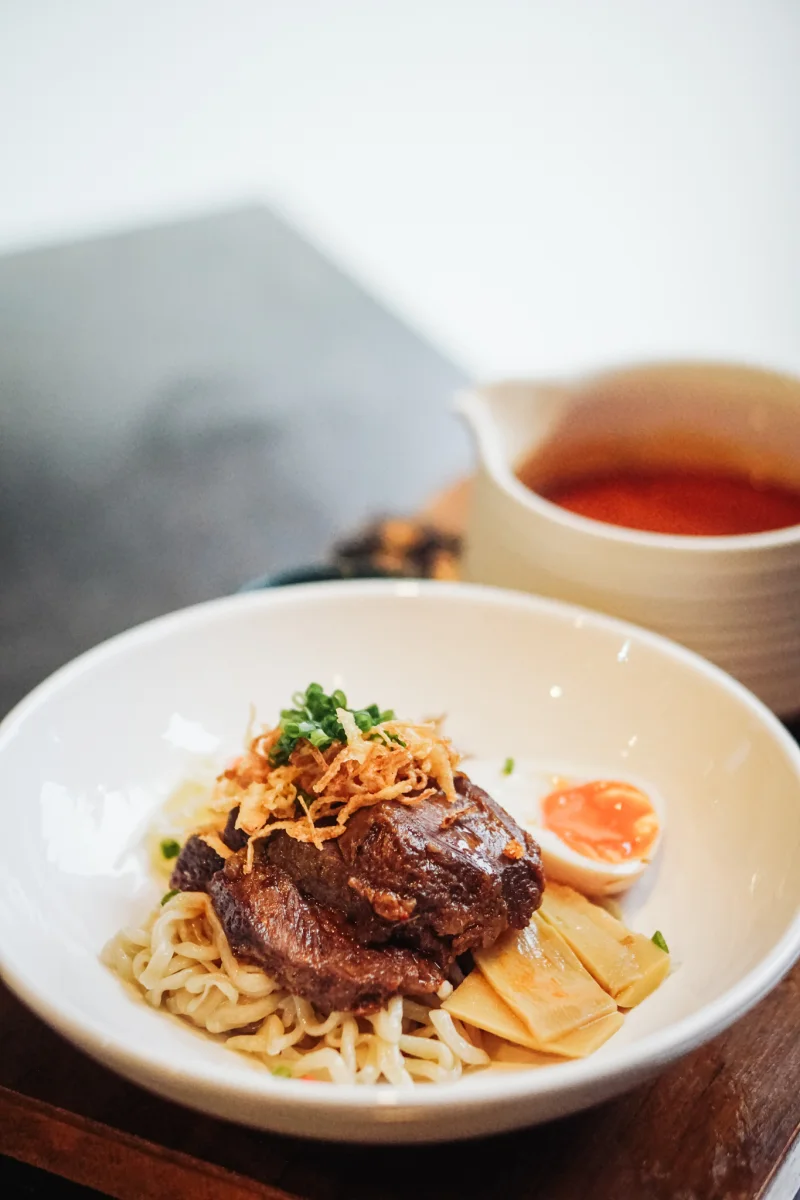 Ramen with braised beef, crispy shallots and a soft-boiled egg